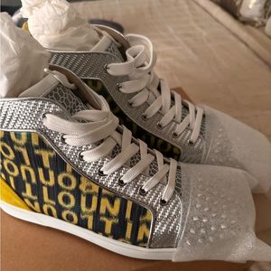 men’s Christian Lou sneakers. Looks brand new.